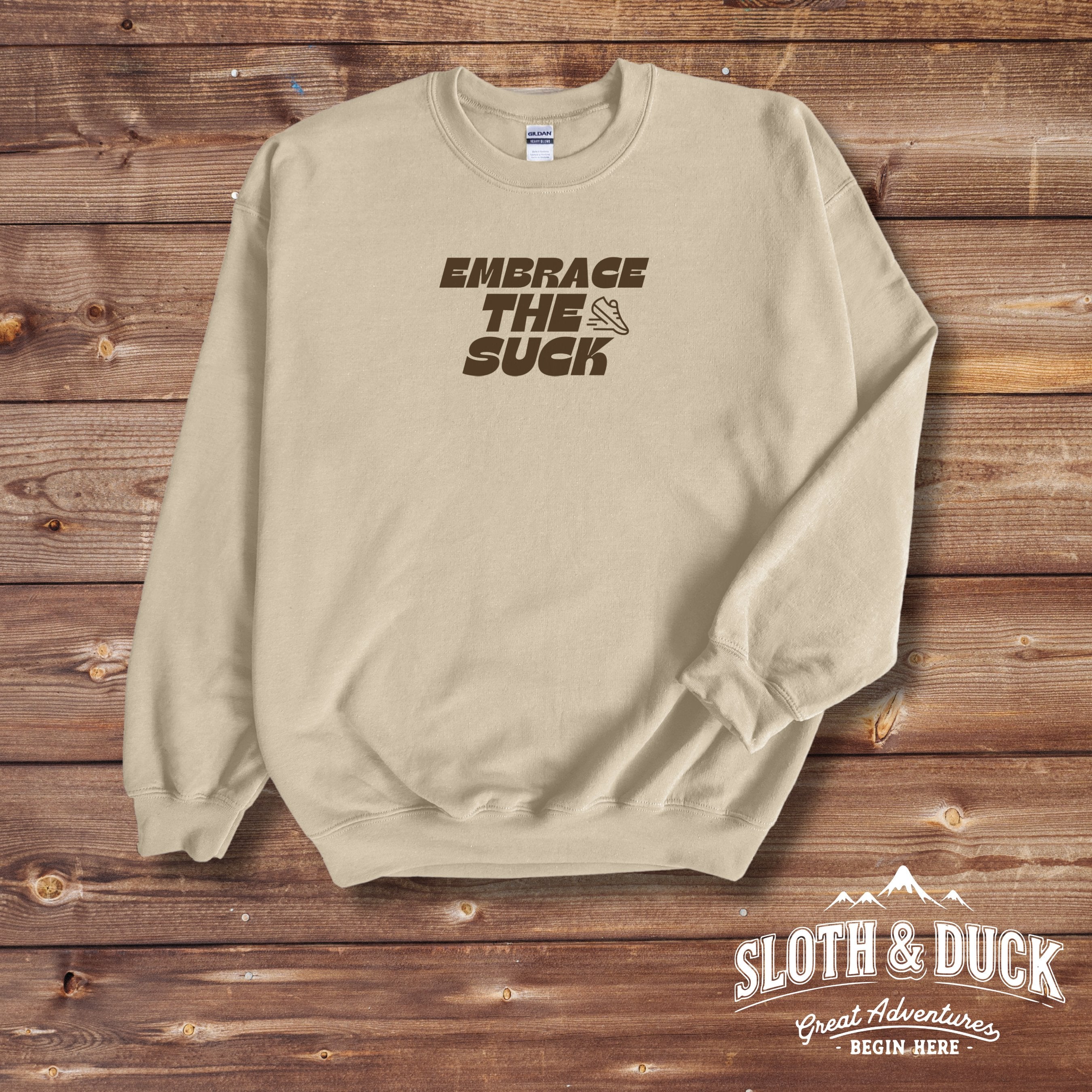 embrace the suck tan crewneck